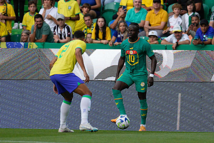 Sadio Mane pictured (right) in action for Senegal during a 4-2 win over Brazil in Lisbon in June 2023